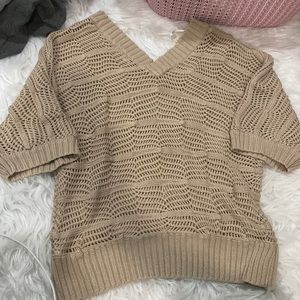 Beige sweater. V neck front & back